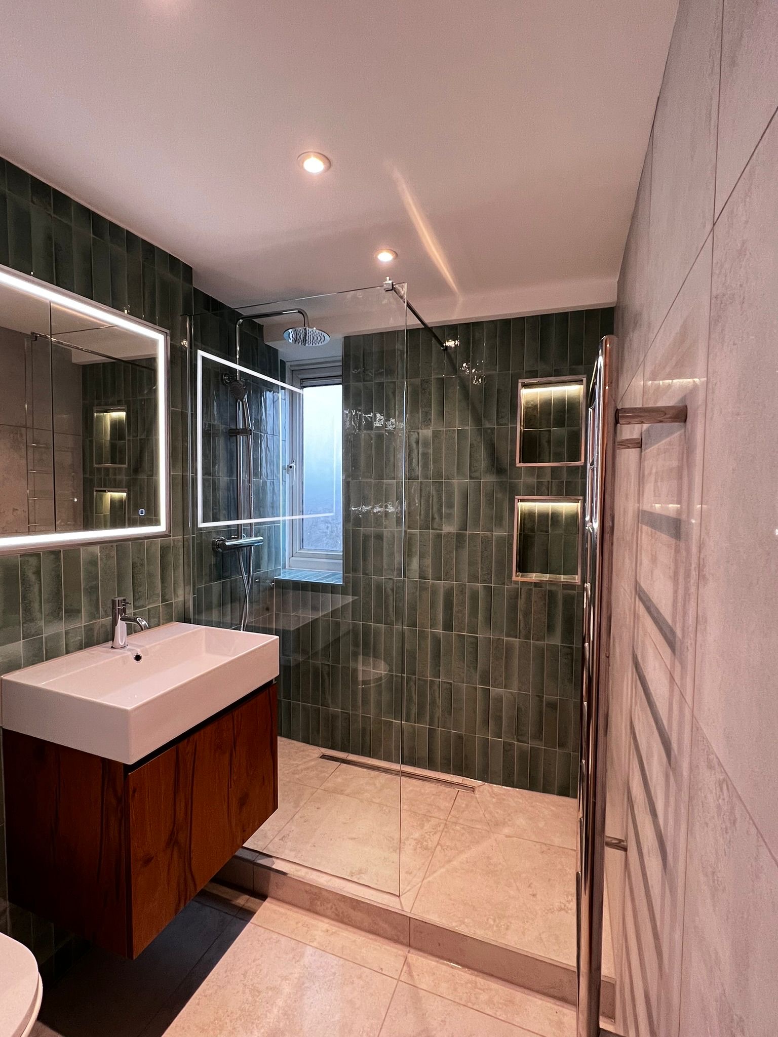 Luxury Bathroom — Green Metro Tiles & Walk-In Shower — Brighton & Hove Property Repair Co. Brighton & Hove Luxury Bathroom — Green Metro Tiles & Walk-In Shower — Brighton & Hove Property Repair Co. Brighton & Hove