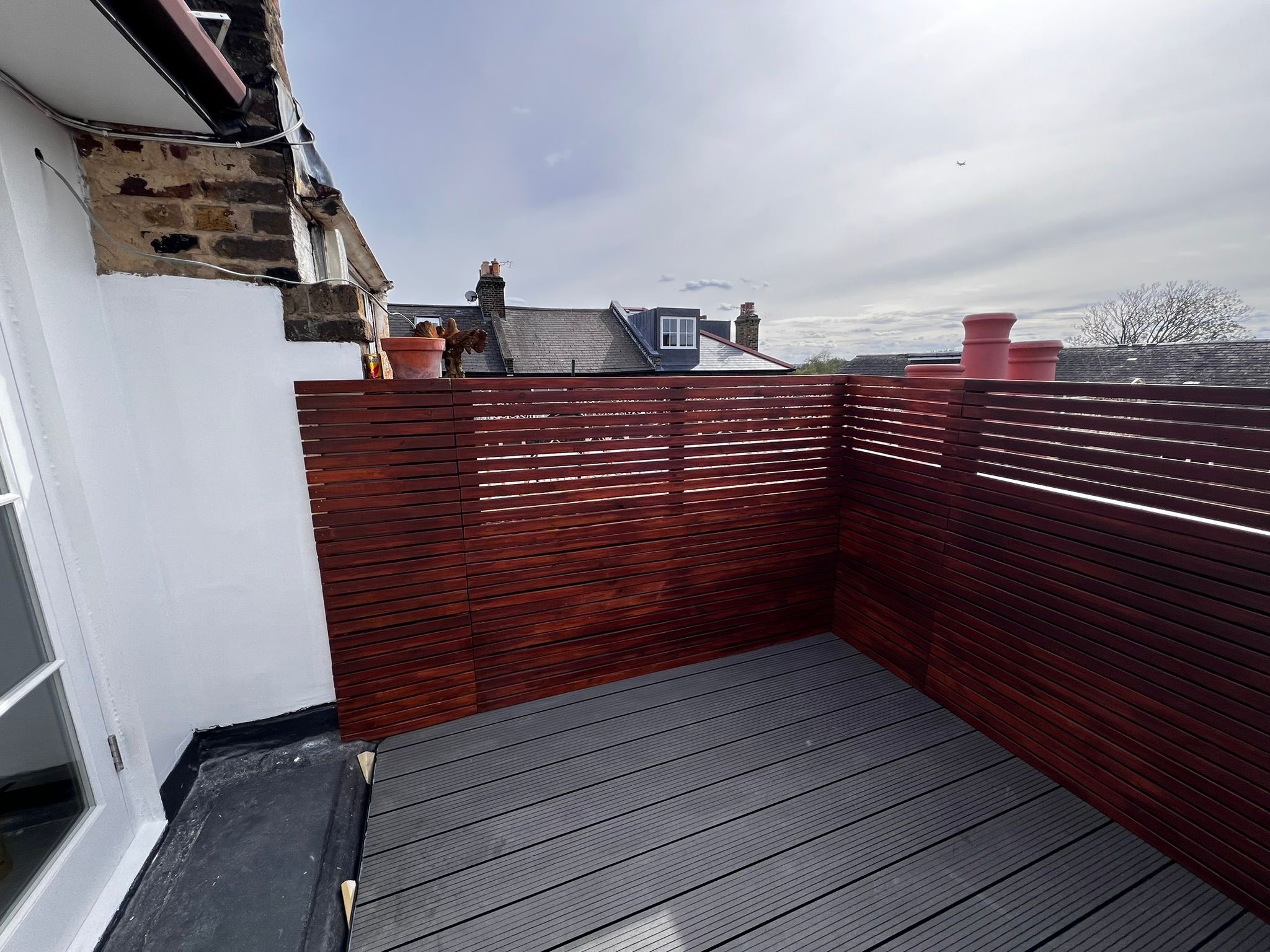 Rooftop terrace with hardwood fence and composite decking