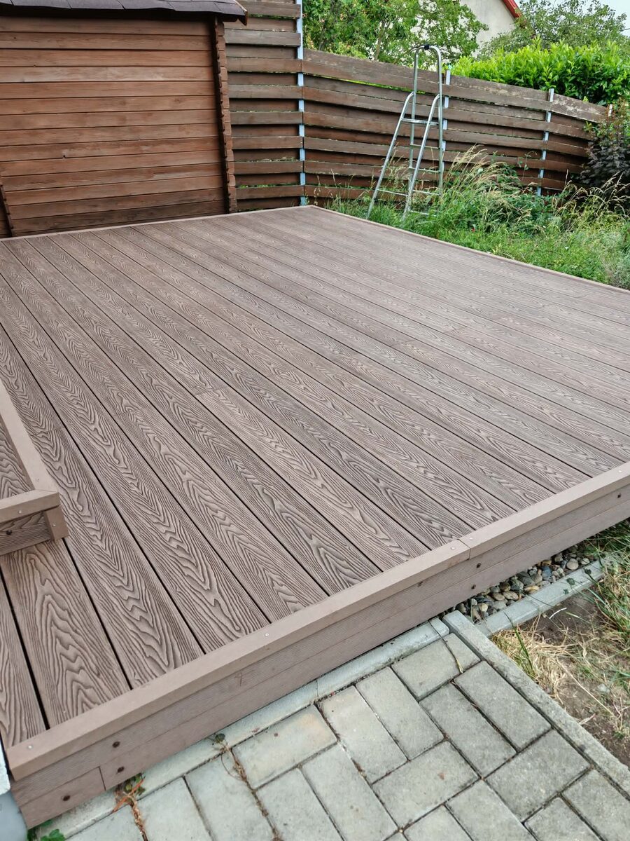 WPC composite decking — warm brown finish, Brighton garden
