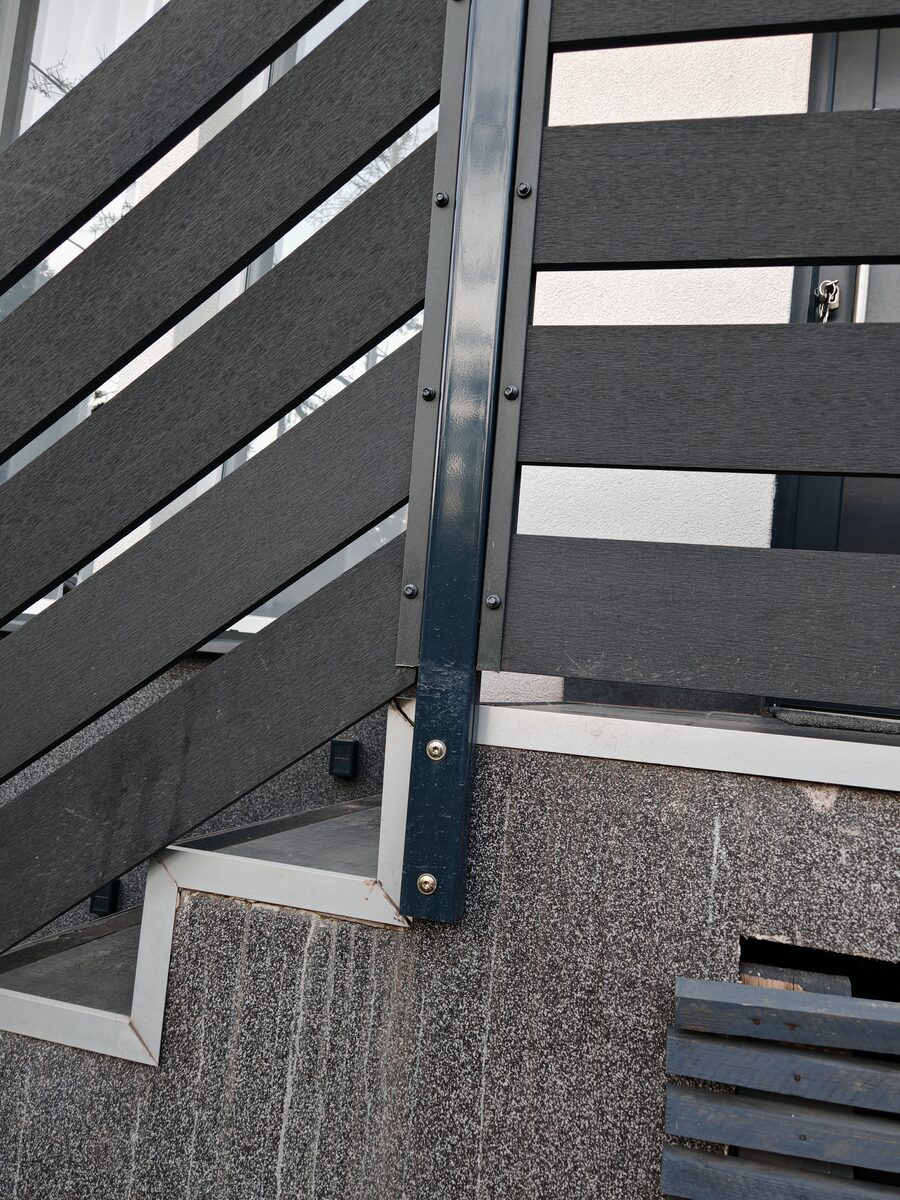 WPC anthracite fence steel post fixing detail — Brighton
