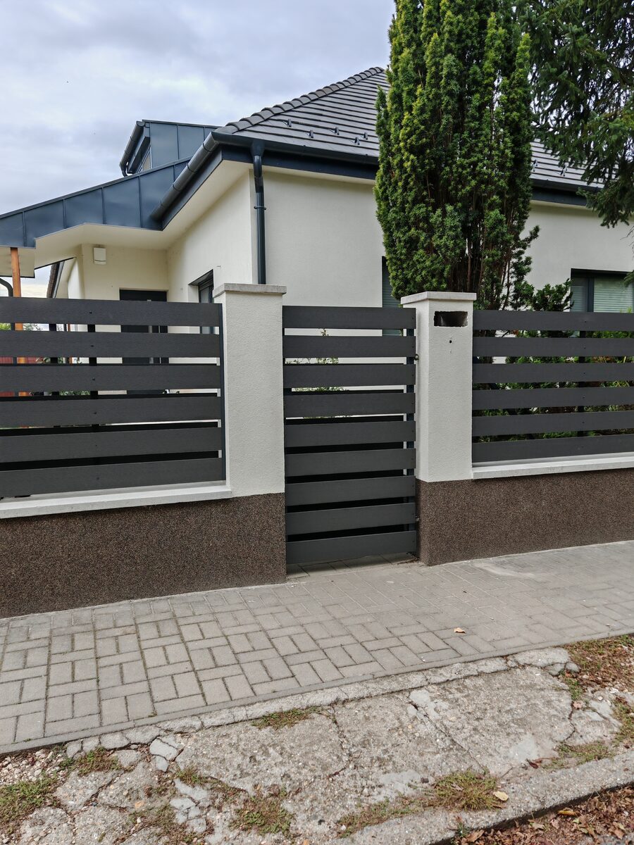 WPC open-slatted front boundary fence with pedestrian gate — Hove